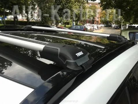Багажник на интегрированные рейлинги Thule WingBar Edge для Audi A3 8P хэтчбек 5-дв